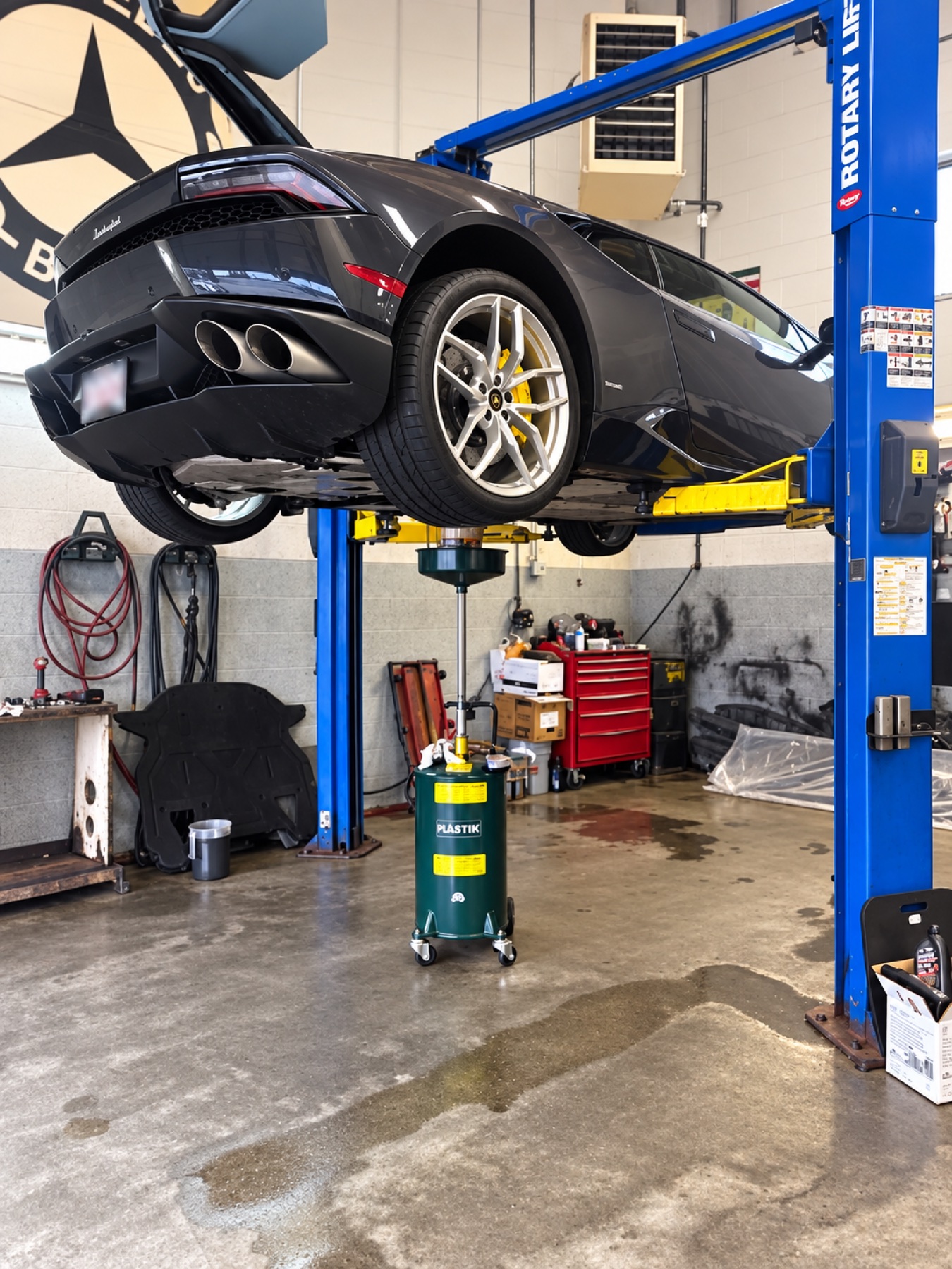 Mechanical maintenance performed on a vehicle lift
